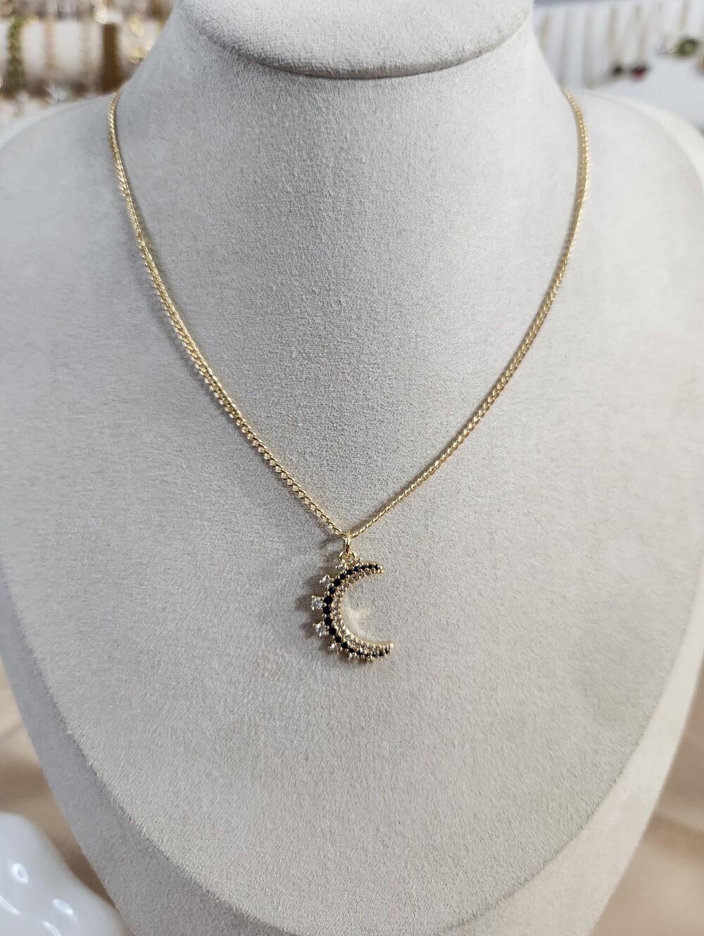 Gold Crescent Moon Pendant Necklace with Blue and Clear Stones